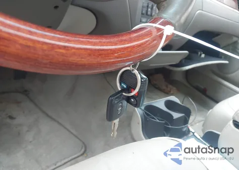 2004 Lincoln Town Car Ultimate из США, поврежденный, VIN 1LNHM83W64Y657300